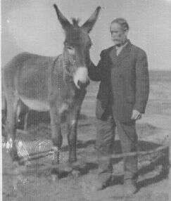 E.M.
McGinnis and mule