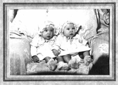 Eloise and Louise Garrett in baby bonnets, 1938